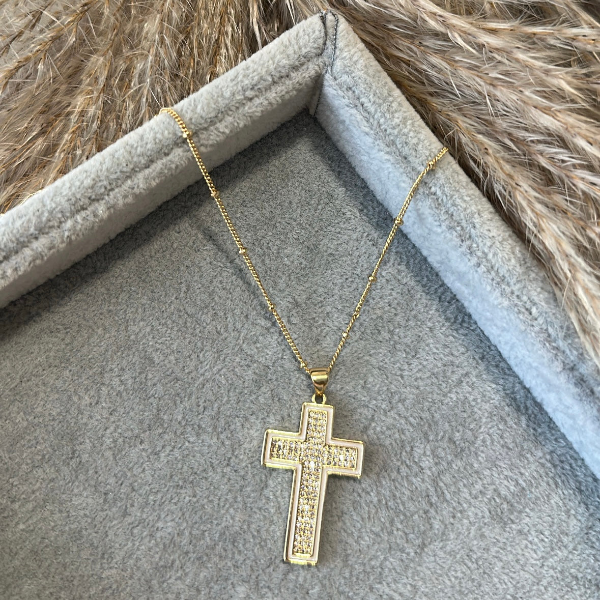 White cross necklace