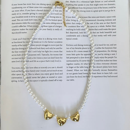 Three hearts and pearls necklace