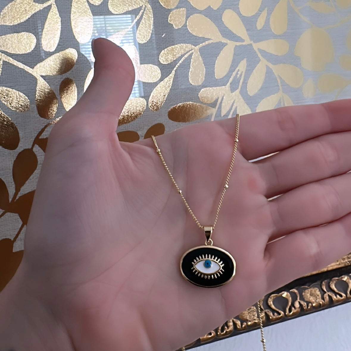 Black eye necklace