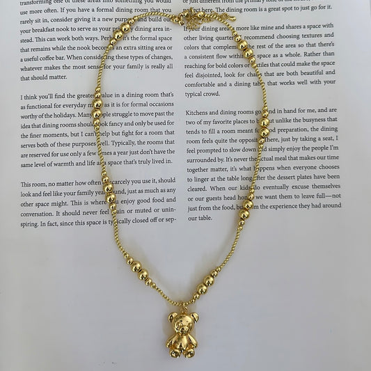Golden bear necklace