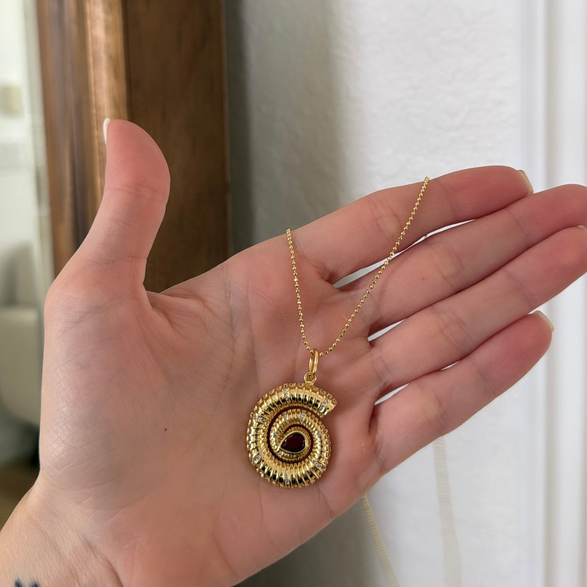 Gold shell necklace